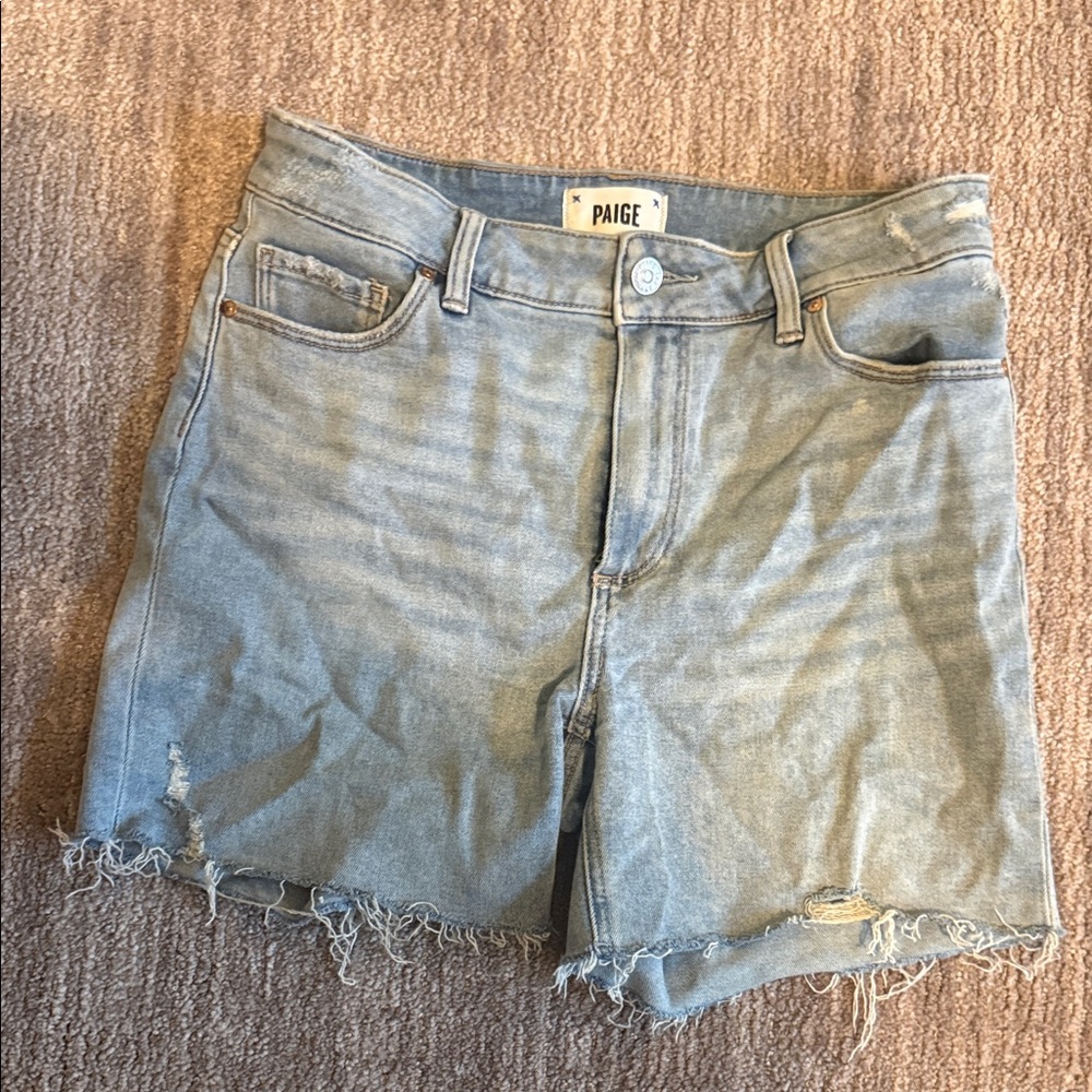 PAIGE Washed Light Blue Denim Cutoff Shorts